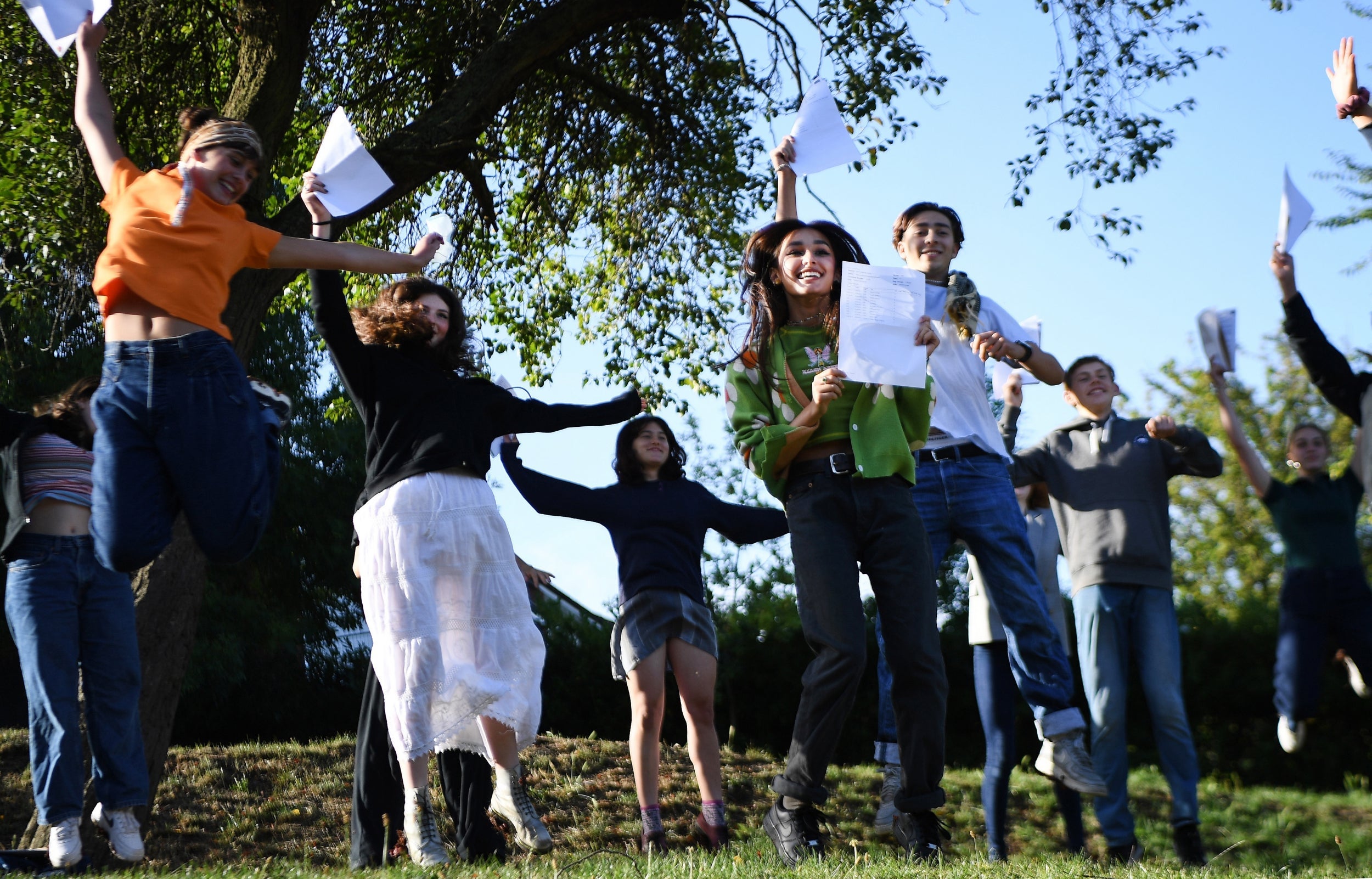 Secondary school students celebrate their GCSE results on Thursday