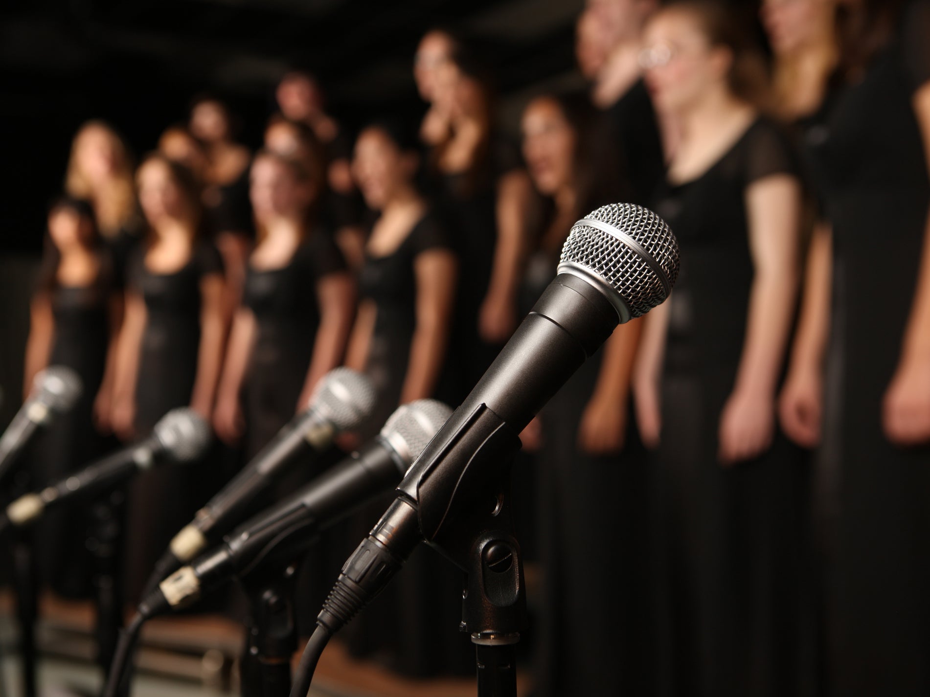 Singing may be no more of an infection risk than speaking, new research indicates
