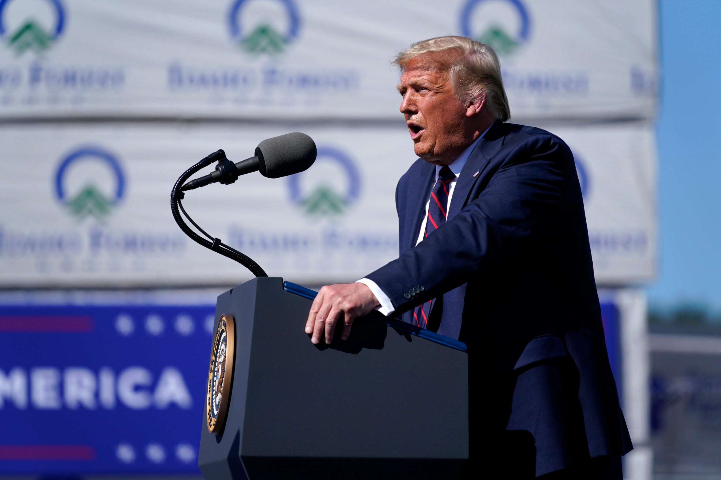 Donald Trump speaks to a crowd of supporters during a campaign stop at Mariotti Building Product in Old Forge, Pennsylvania, on 20 August, 2020