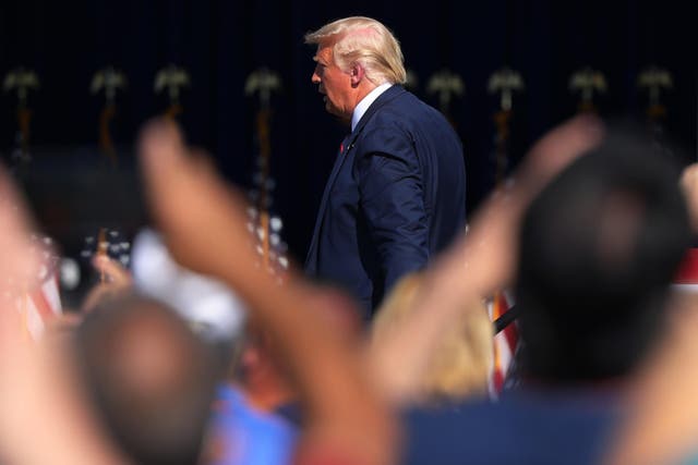 OLD FORGE, PENNSYLVANIA - AUGUST 20: U.S. President Donald J. Trump walks down a ramp after speaking at his campaign rally on August 20, 2020 in Old Forge, Pennsylvania. President Trump is campaigning in the battleground state of Pennsylvania near the hometown of former Vice President Joe Biden, hours before Biden will accept the Democratic Presidential nomination on the last day of the Democratic National Convention.