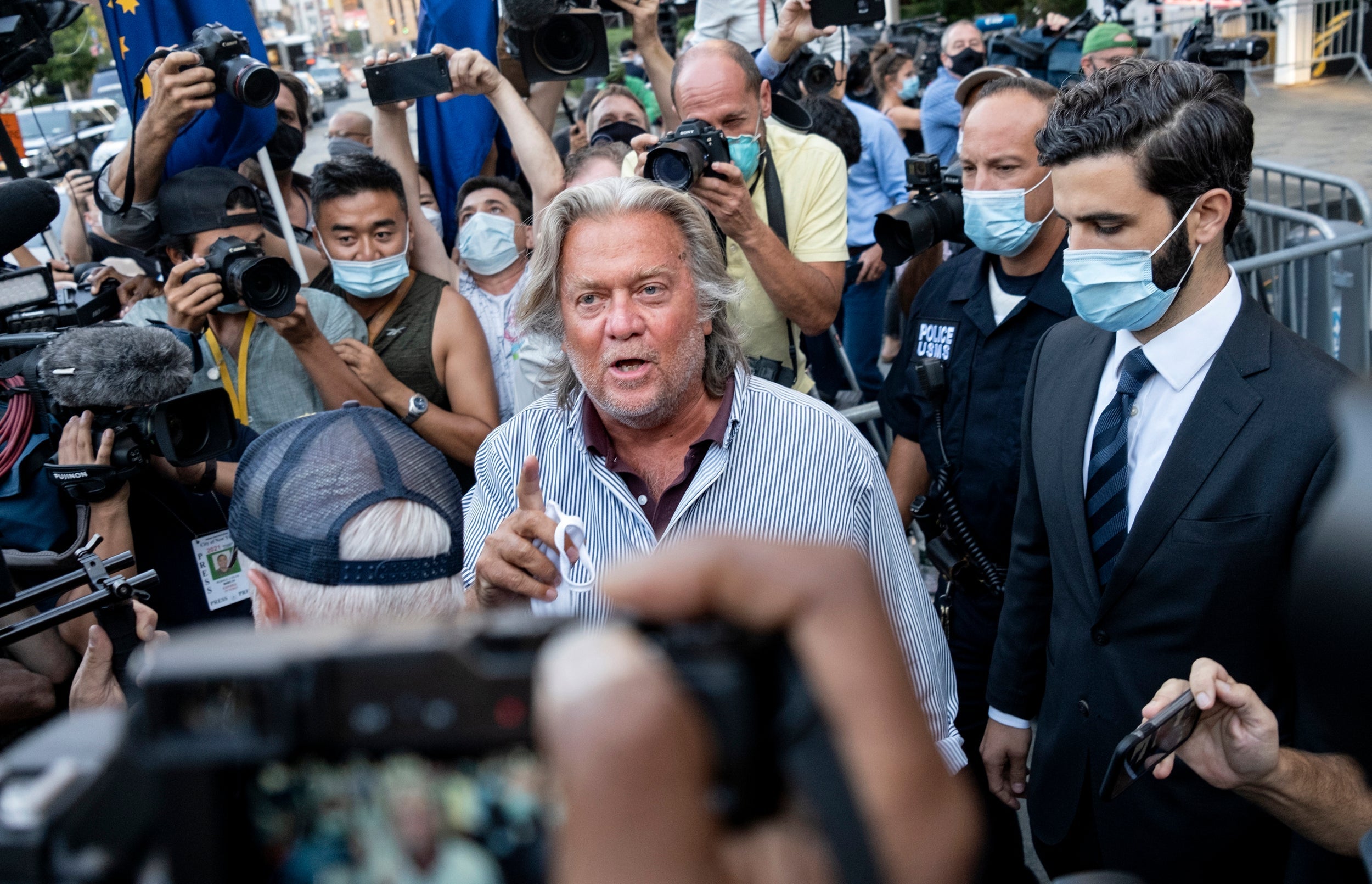 Steve Bannon speaks to reporters outside a court in New York after his first appearance on fraud charges