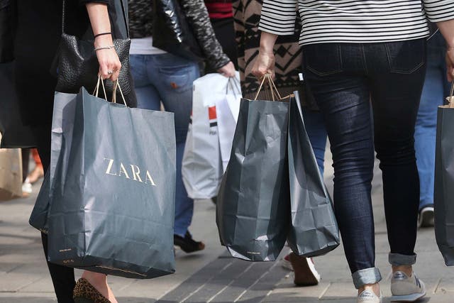 Shoppers returned to high streets in increasing numbers last month but business at clothes and household goods stores remains below pre-pandemic levels, official figures show