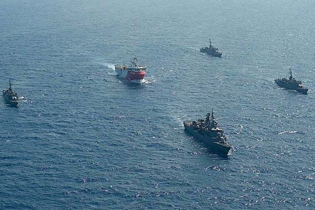 A Turkish seismic research vessel is escorted by naval ships