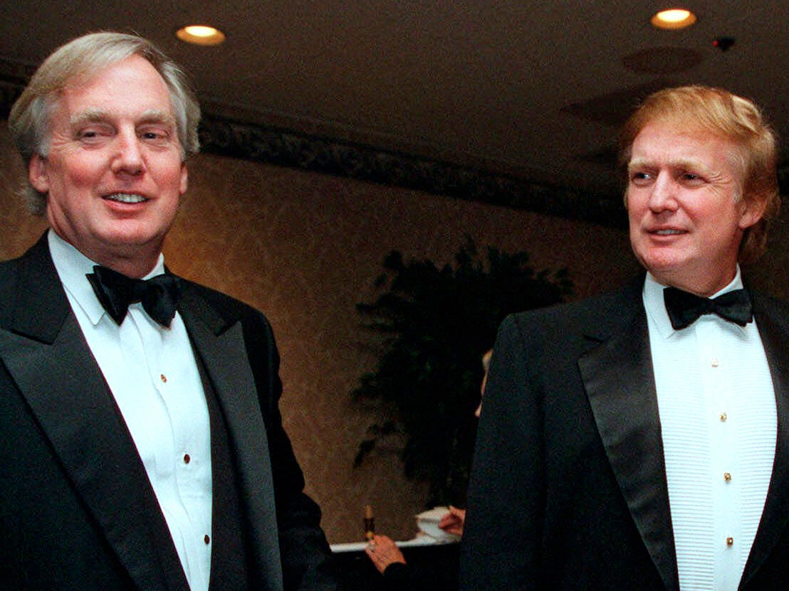 Robert Trump, left, joins then real estate developer and presidential hopeful Donald Trump at an event in New York
