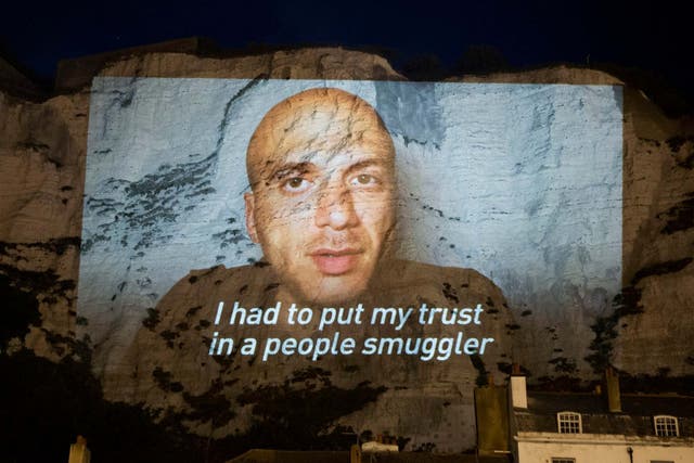 Led By Donkeys handout photo of their display projected onto the White Cliffs of Dover
