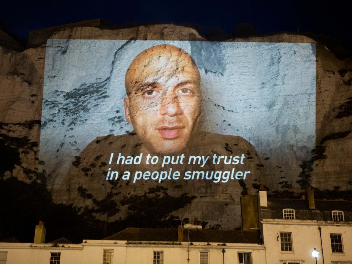 Syrian refugee calls for compassion towards migrants in emotional plea projected onto White Cliffs of Dover