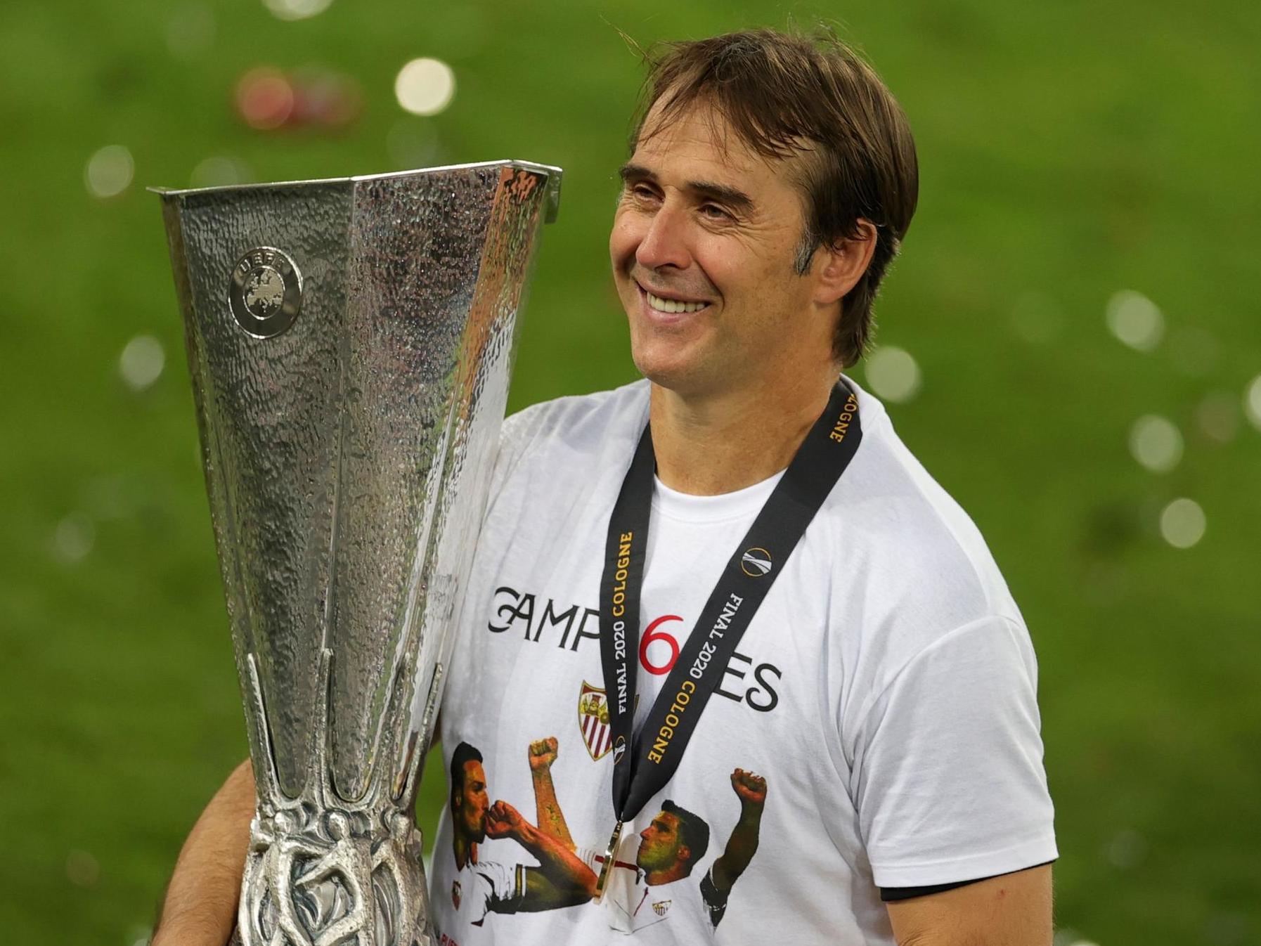 Julen Lopetegui beams with the Europa League trophy after victory over Inter Milan