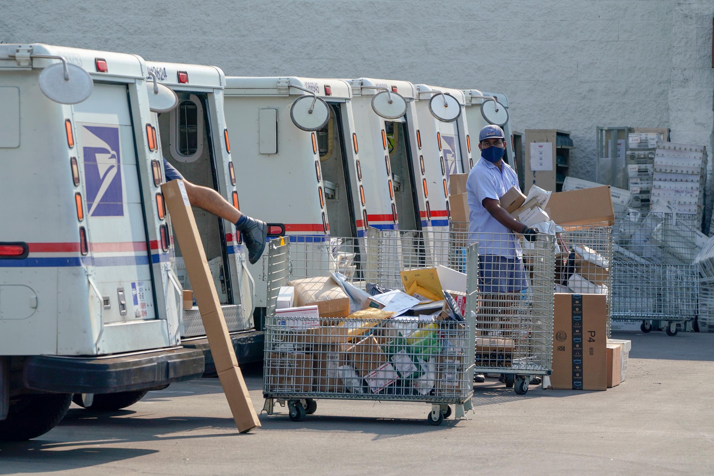 US House agrees $25bn for Postal Service amid Trump attacks – but Republicans likely to block