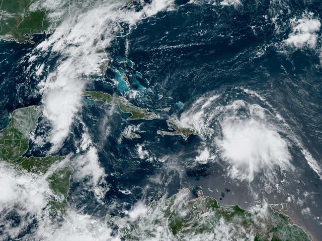 Tropical Storms Laura and Marco are both advancing across the Caribbean towards the US Gulf Coast