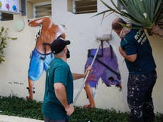 'Peeping Toms' mural on women's toilets removed from Tel Aviv beach after suspected gang rape