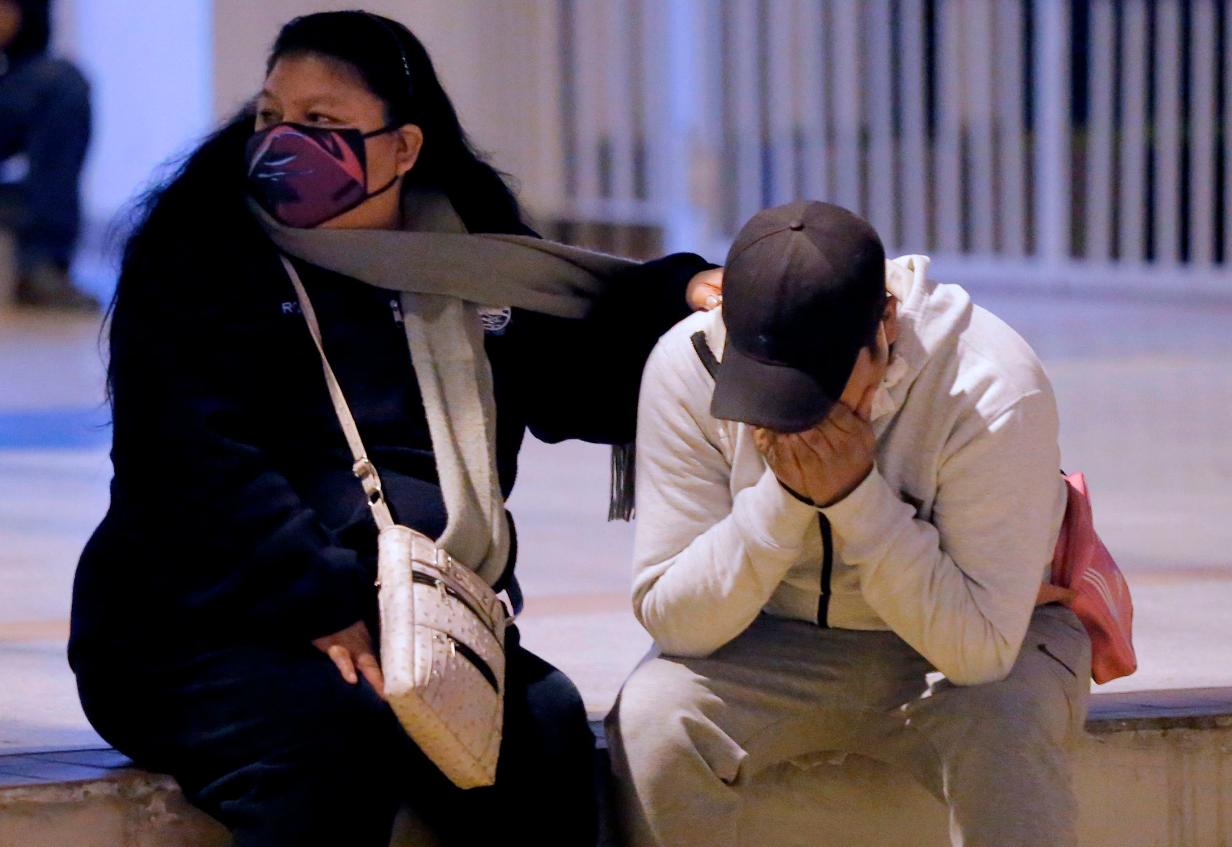 &#13;
A person is comforted outside the nightclub &#13;