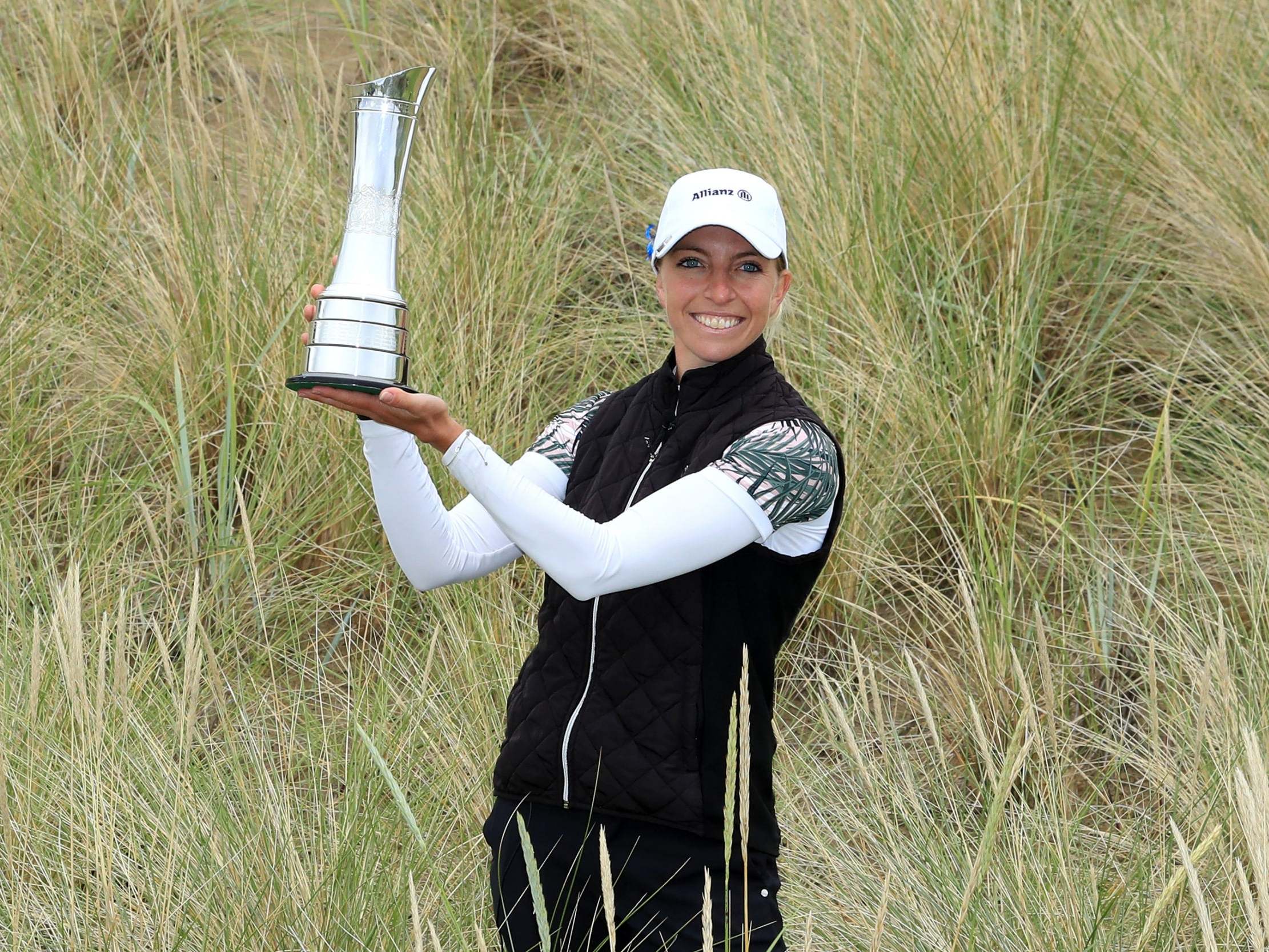 Sophia Popov celebrates with the trophy at Royal Troon