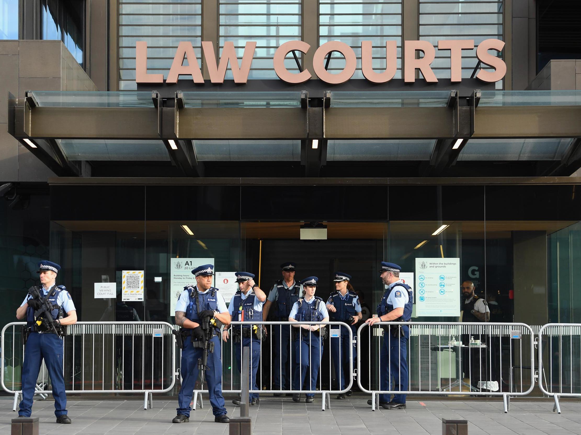 Armed police officers are seen in front of Christchurch High Court during the sentencing hearing of Brenton Tarrant
