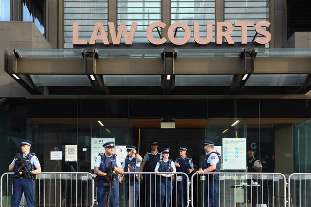 Armed police officers are seen in front of Christchurch High Court during the sentencing hearing of Brenton Tarrant