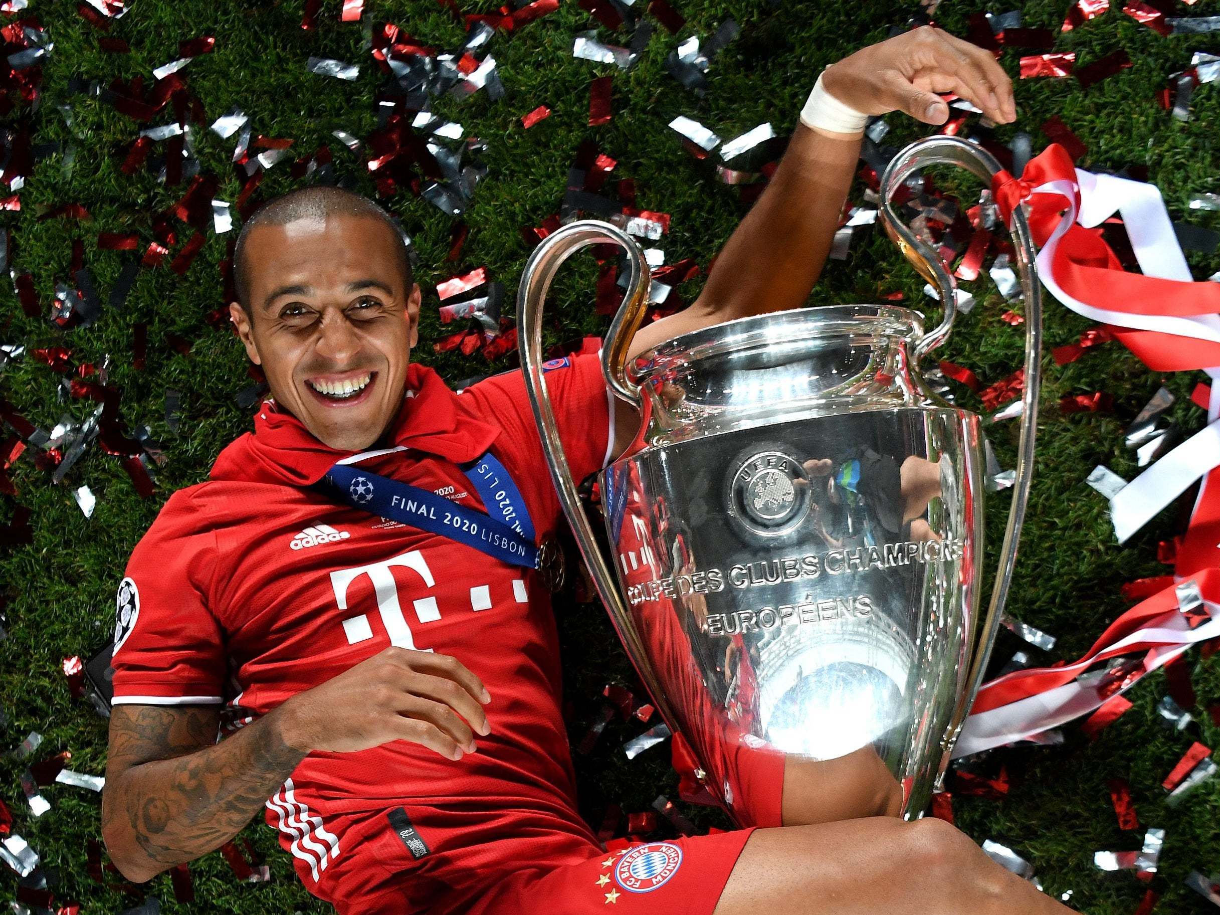 Thiago celebrates winning the Champions League