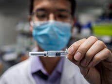 China has been giving key workers Covid vaccine, says top official