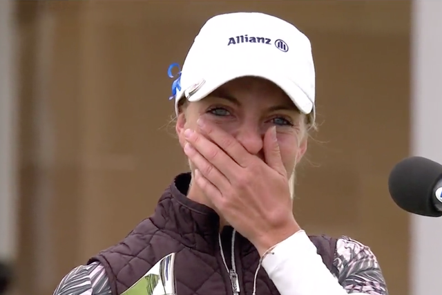 Popov reacts after winning the AIG Open