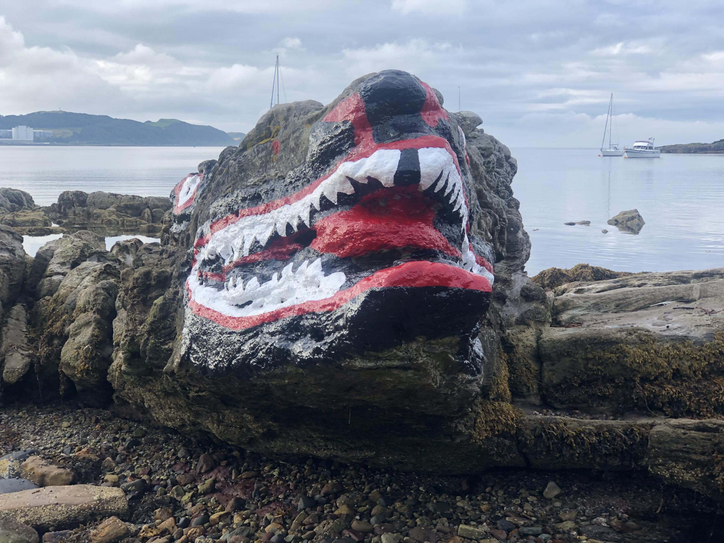 Rock star: the stone crocodile decorating the shore in Millport