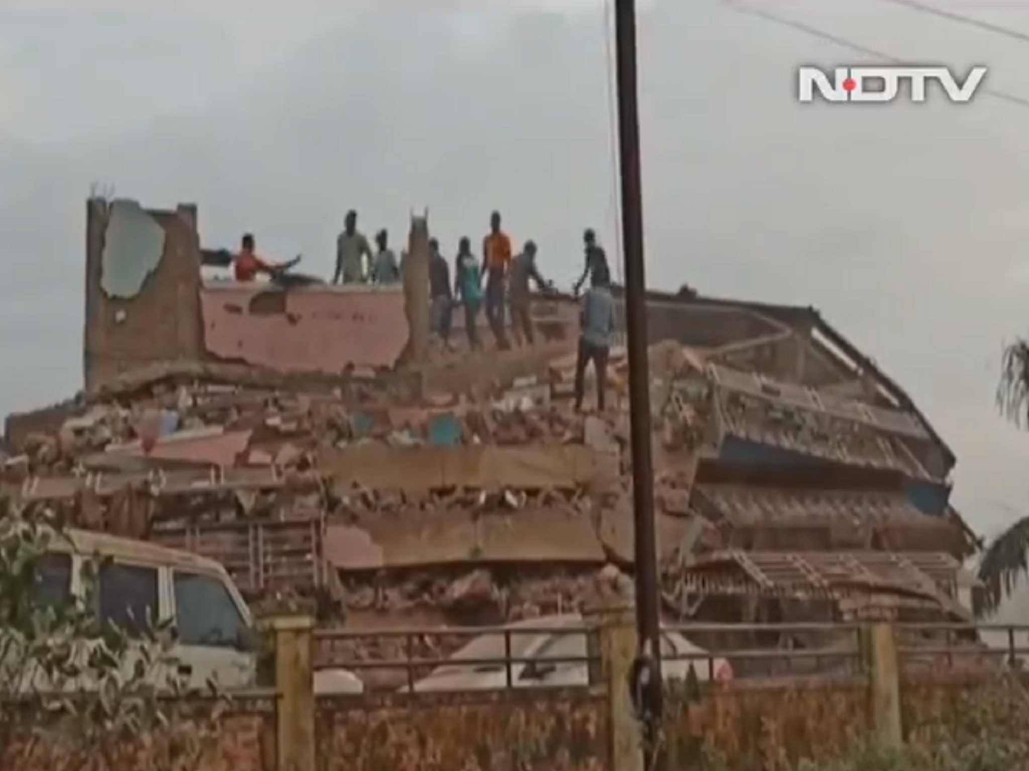 Screengrab from NDTV (New Delhi Television) video footage showing the collapse of a five-storey building in Mahad, India, 24 August 2020.