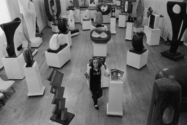 Sculptor Barbara Hepworth surrounded by various examples of her work in December 1967.