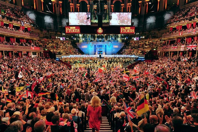 People wave flags during the Last Night Of The Proms