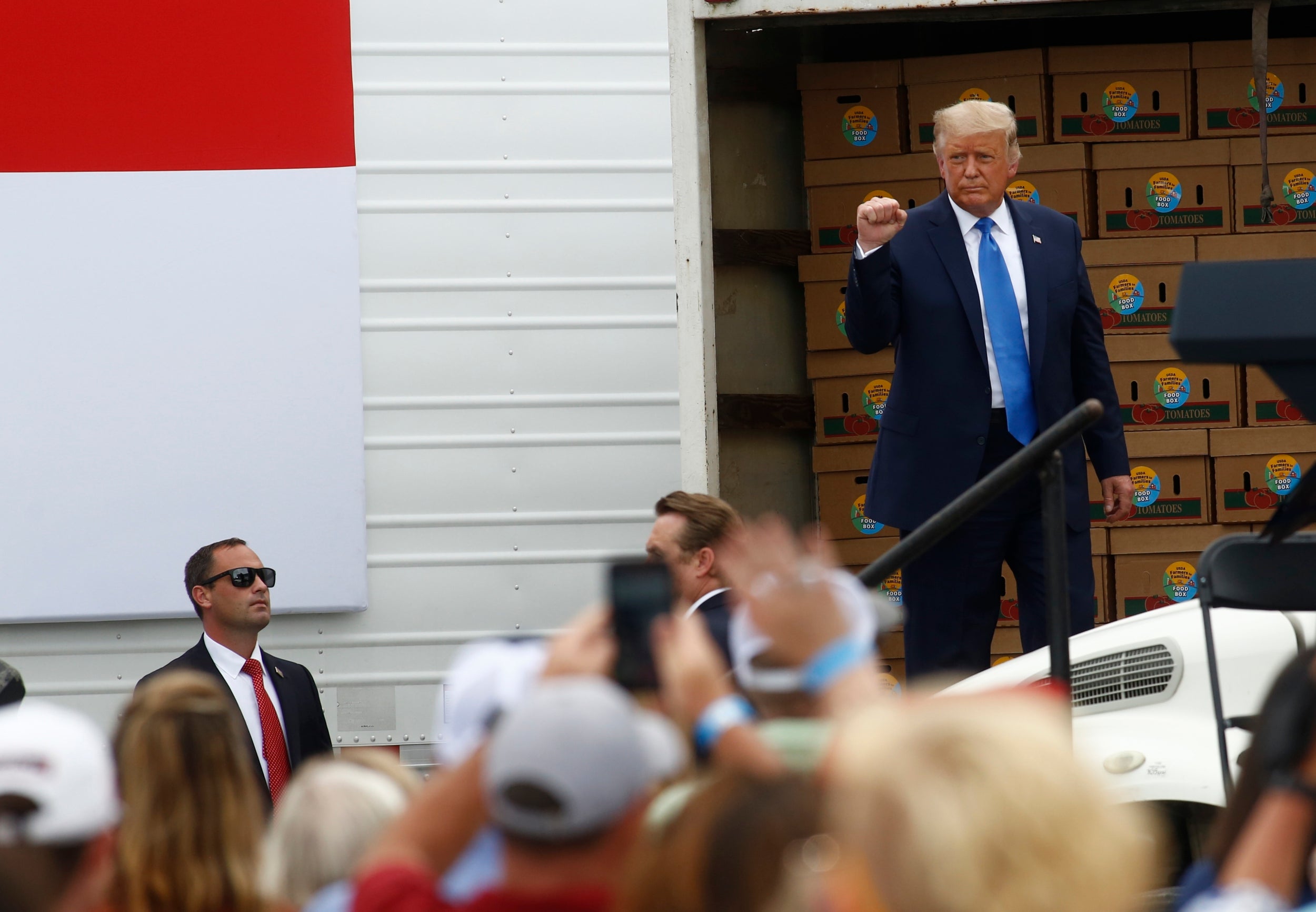 Donald Trump leaves the stage after speaking at Flavor 1st Growers &amp; Packers on August 24, 2020 in Mills River, North Carolina