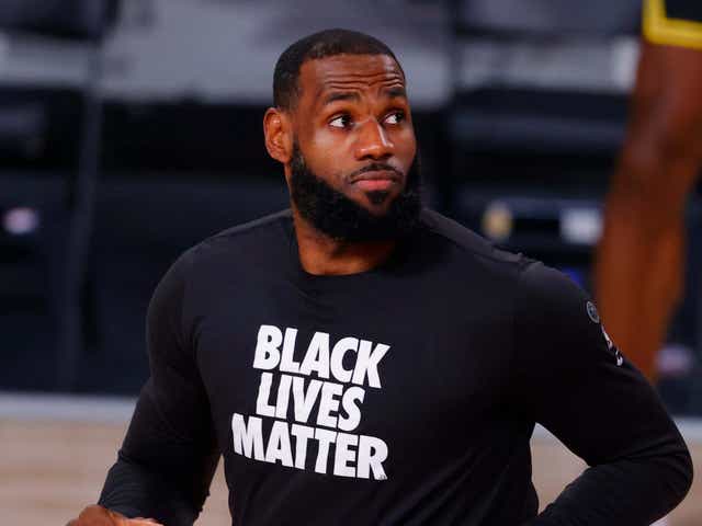 LeBron James sports a Black Lives Matter jersey while warming up for a game