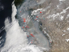 Huge wildfire smoke cloud blocks view of California from space as 650 blazes rage in the state
