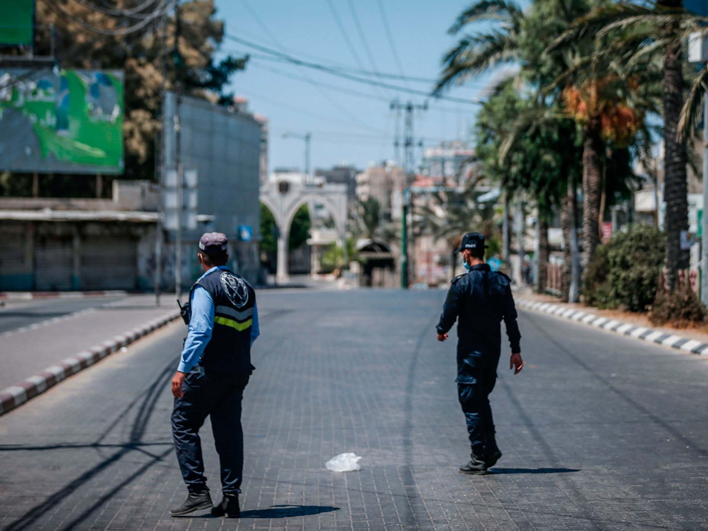 Officers patrol Gaza after a two-day lockdown was imposed
