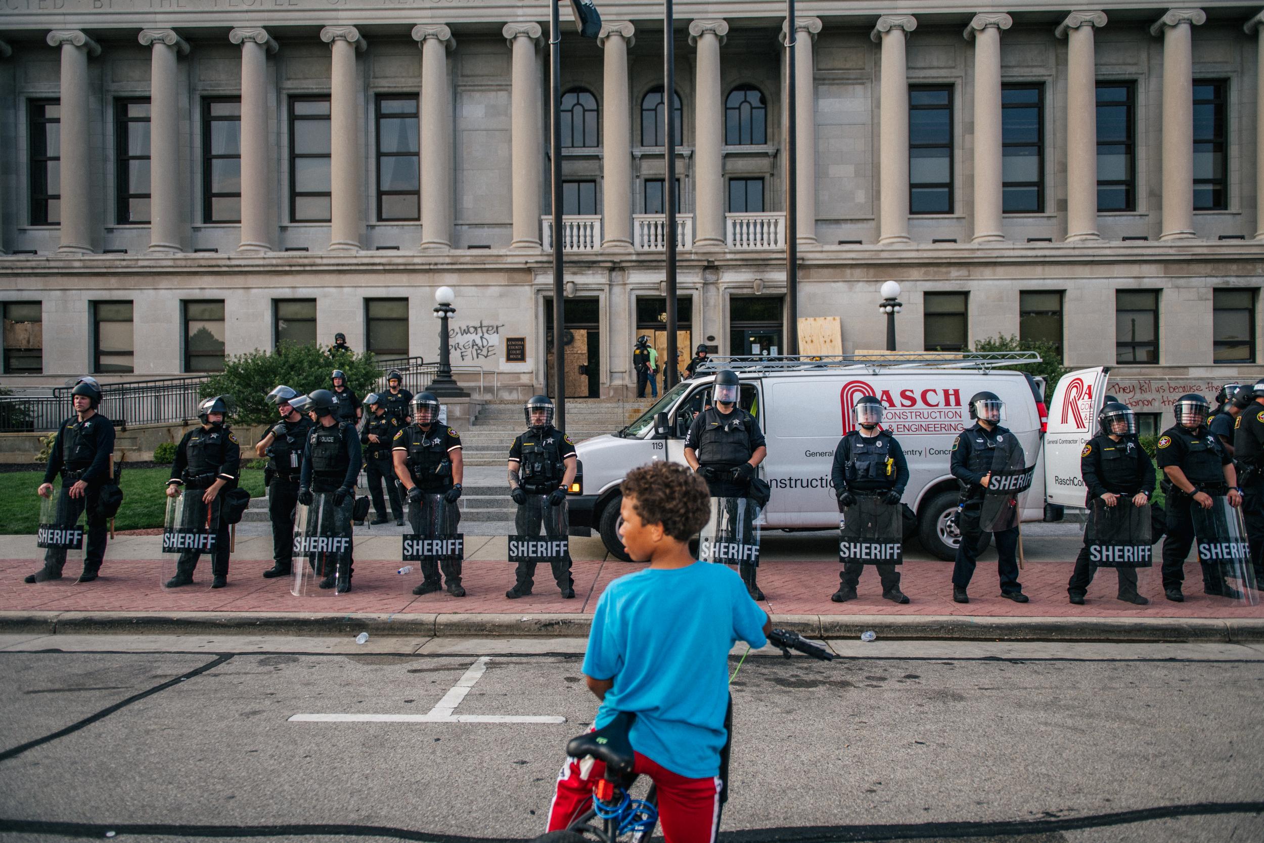 Police officers outside the Kenosha County Courthouse in Kenosha, Wisconsin (Getty)