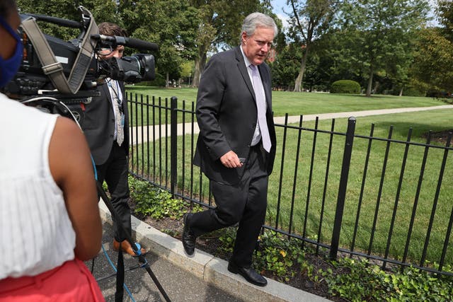 WASHINGTON, DC - AUGUST 21: White House Chief of Staff Mark Meadows walks quickly past reporters as he returns to the West Wing following an interview with FOX News outside the White House on August 21, 2020 in Washington, DC. Meadows talked about Postmaster General Louis DeJoy's testimony before the Senate Homeland Security and Government Affairs Committee.
