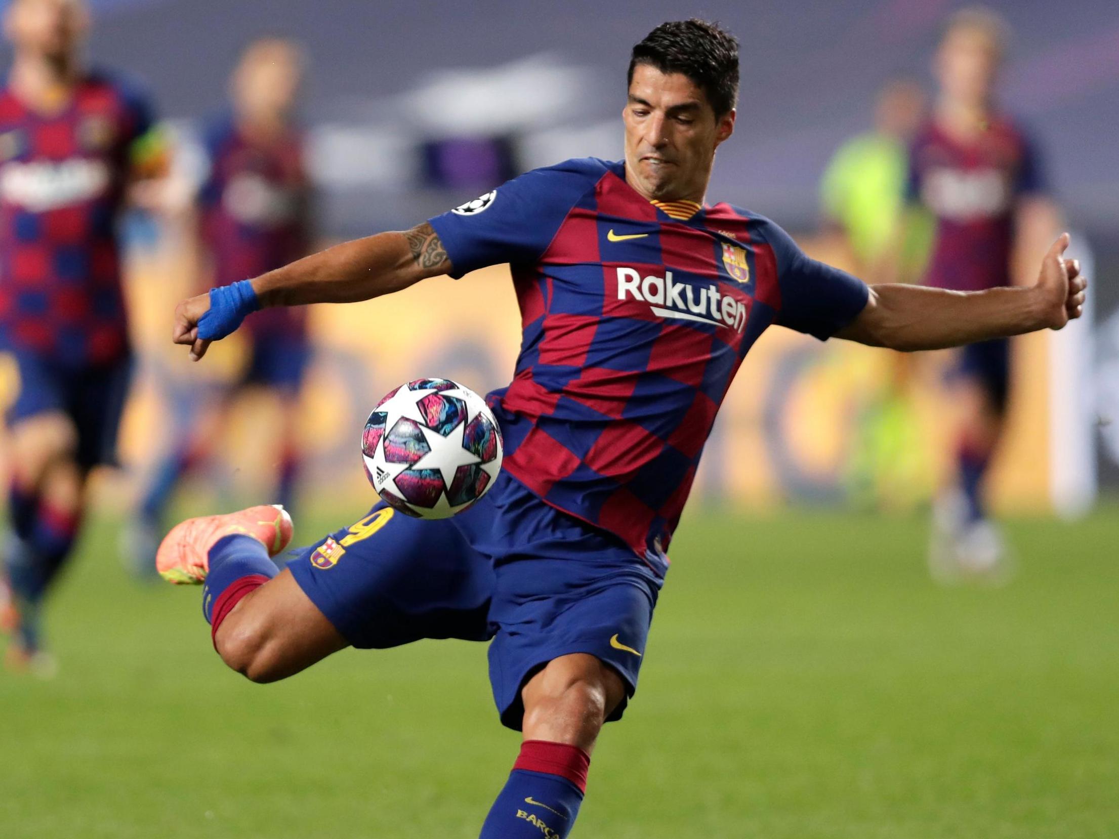 Barcelona's Uruguayan forward Luis Suarez kicks the ball