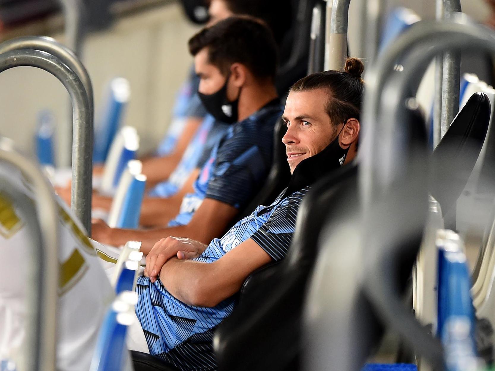 Gareth Bale of Real Madrid sits on the bench