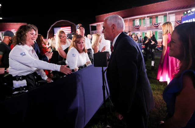 Mike Pence greets supporters following his speech at Fort McHenry in Maryland during the Republican National Convention