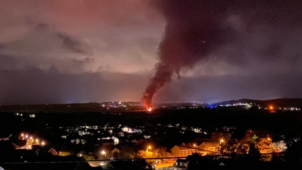 The huge plume of black smoke was visible from several miles away