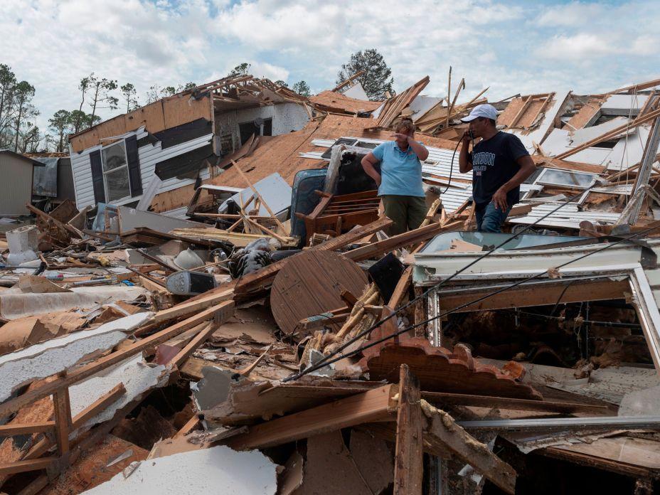 Residents in Louisiana survey the wreckage of their home following Hurricane Laura this week