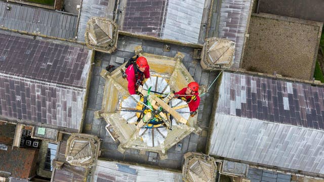 Father and son team Chris and Sam Milford from historic building conservation specialists WallWalkers begin restoration work on the spire of Norwich Cathedral, which stands at over 312ft high. The first known spire was completed in 1297