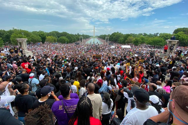 Thousands flocked to the National Mall in Washington on Friday to protest racial inequality and black deaths at the hands of law enforcement. AFP via Getty Images