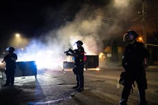 Trump retweets claim Portland mayor is 'f***ing idiot' after man shot dead in night of protester clashes with MAGA supporters