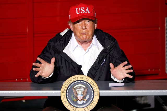 Donald Trump gestures during a briefing at Lake Charles Fire House  as he visits nearby areas damaged by Hurricane Laura in Lake Charles, Louisiana, on 29 August, 2020