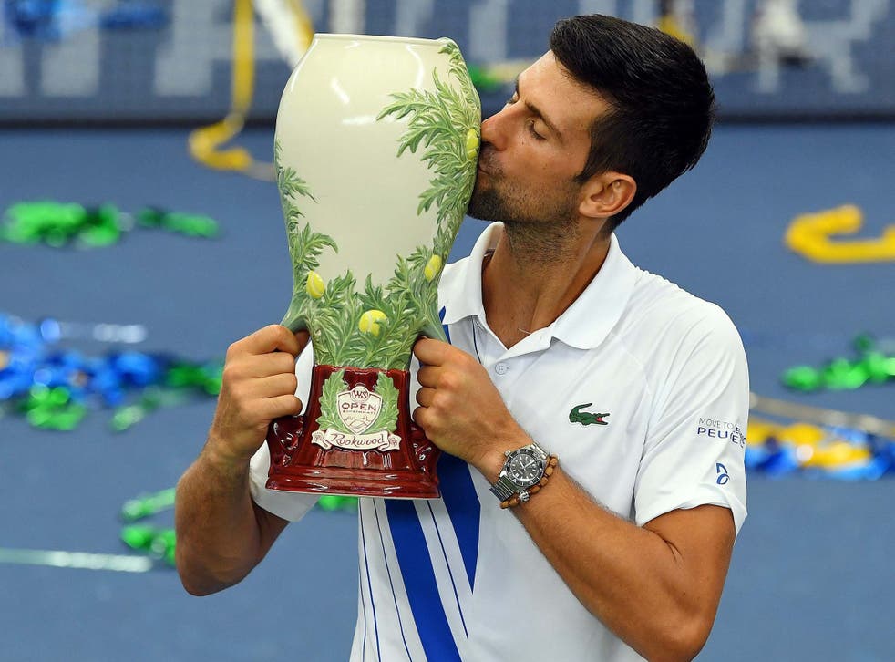 Novak Djokovic celebrates winning the Western & Southern Open