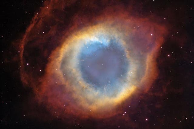 Stealing the show: the ancient Helix Nebula, a multicoloured shell of gas puffed out by a dying star