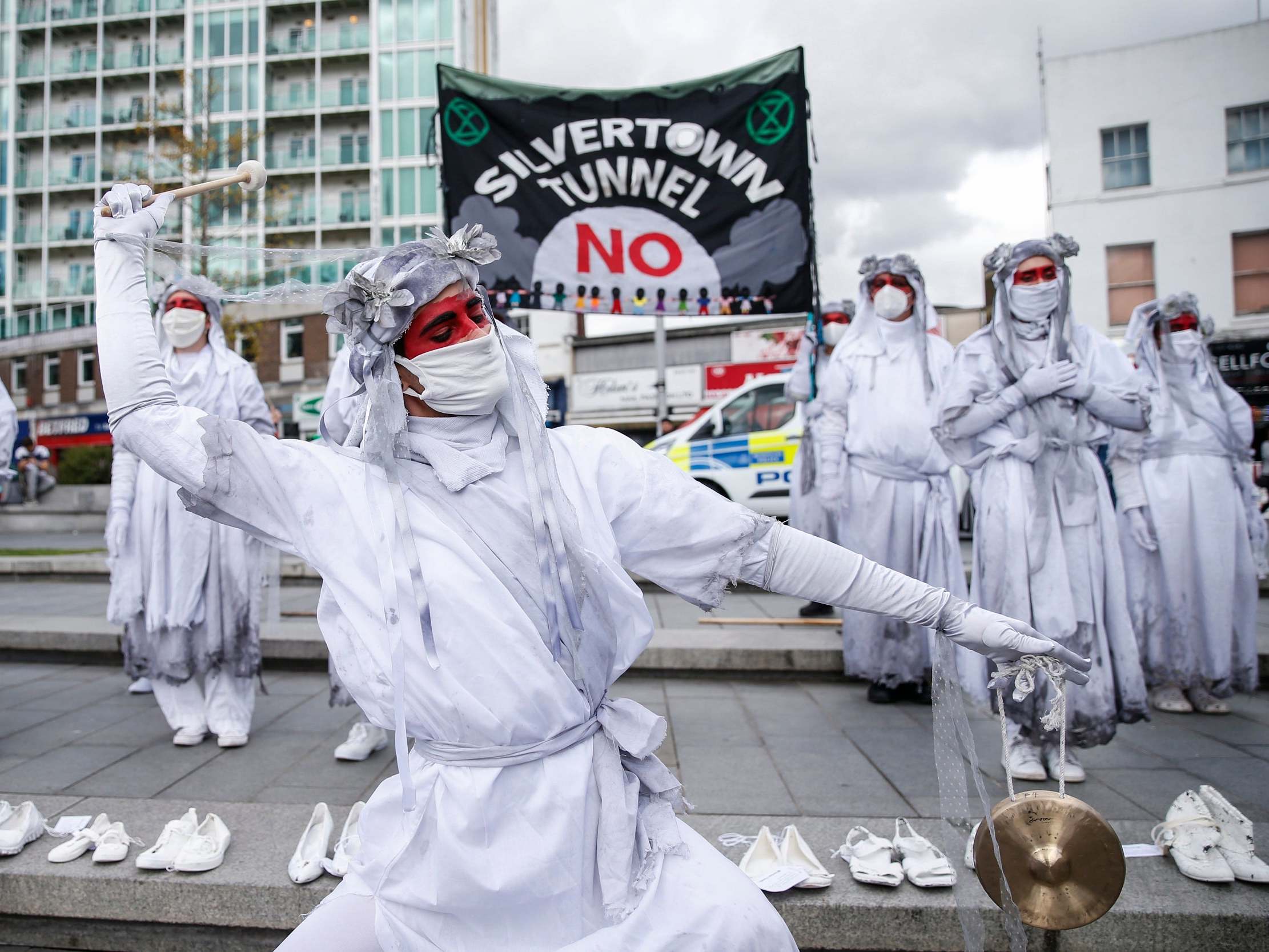 Banshees wail during an Extinction Rebellion protest against a new road tunnel under the Thames in southeast London.