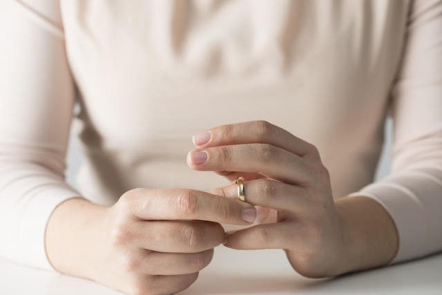 Woman says she found out about ex-husband's infidelity through wedding announcement (Stock)