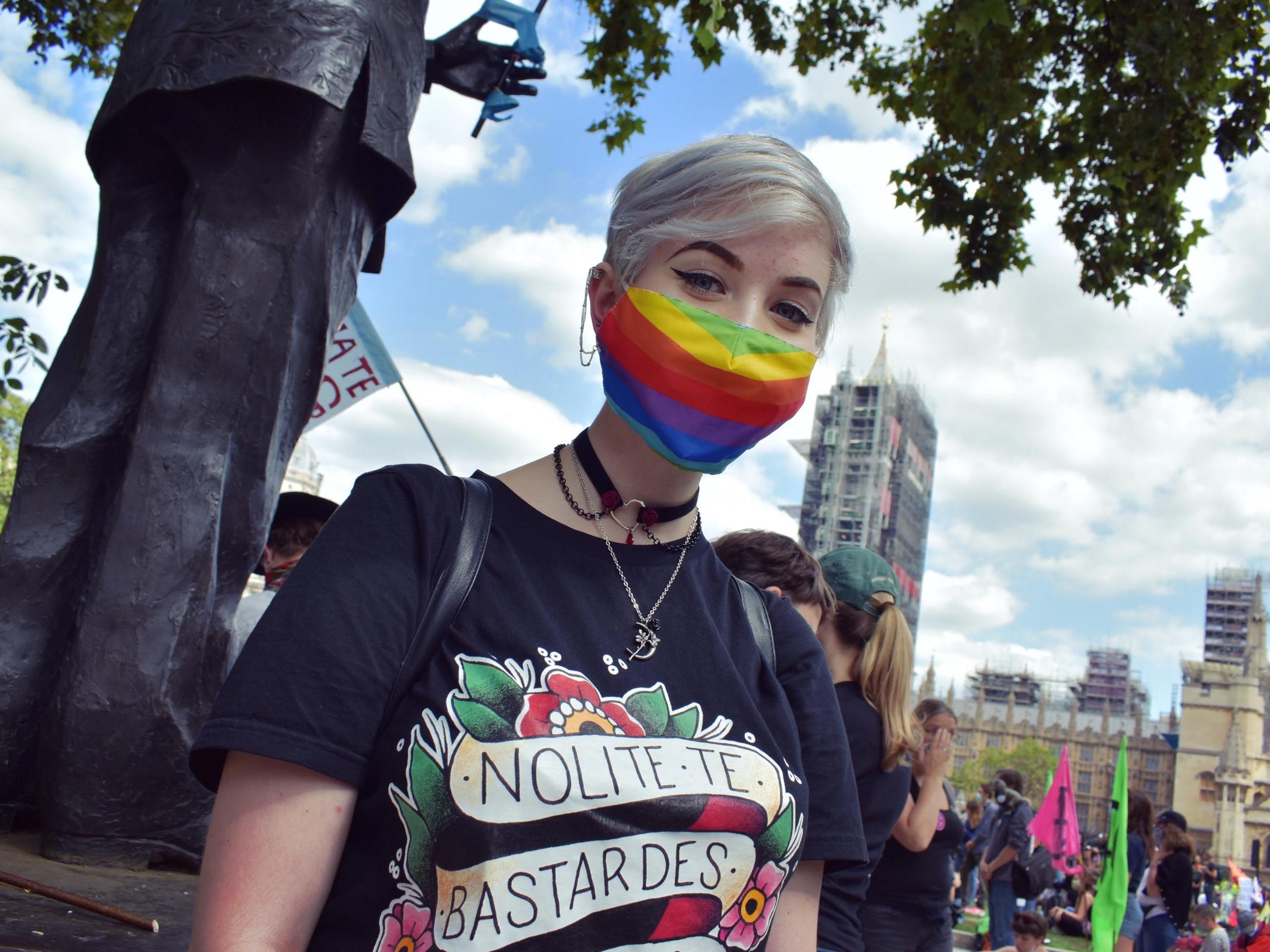 Cat Savage protests outside parliament