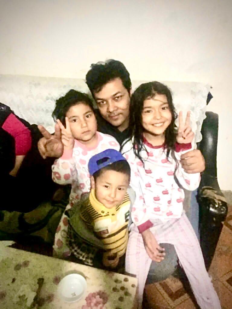 Tahir Imin with his nieces and nephews, whose whereabouts are still unknown after their parents were detained