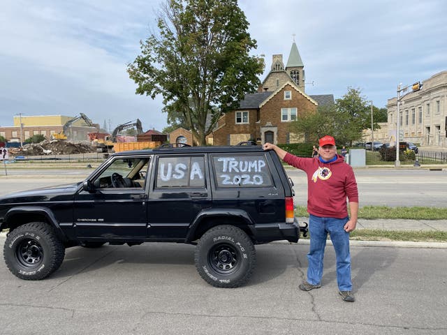 Dan Cox, a Trump supporter from nearby Libertyville, came to show his support for the president during his visit to Kenosha.