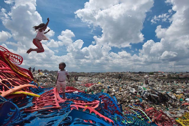 Two children play on a plastic dump in the Dandora slum of Nairobi, Kenya, before a ban on plastic bags came into force in Kenya in 2017. The oil industry has recently asked the US to pressure Kenya to change its world-leading stance against the plastic waste that litters Africa, according to environmentalists