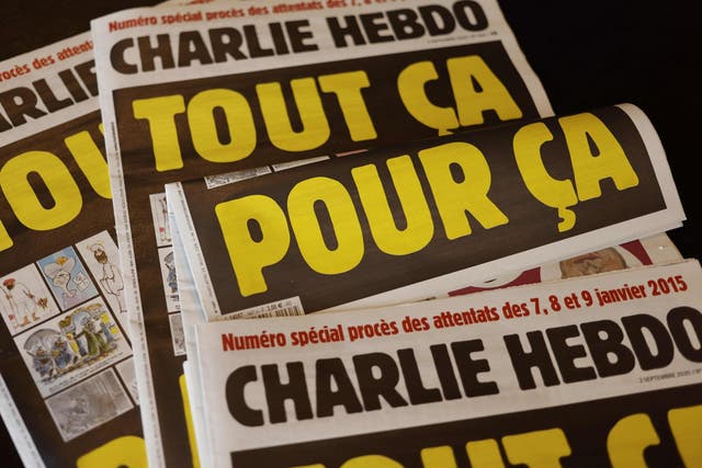 The cover of Charlie Hebdo reads 'All of this, just for that', will be published on 2 September