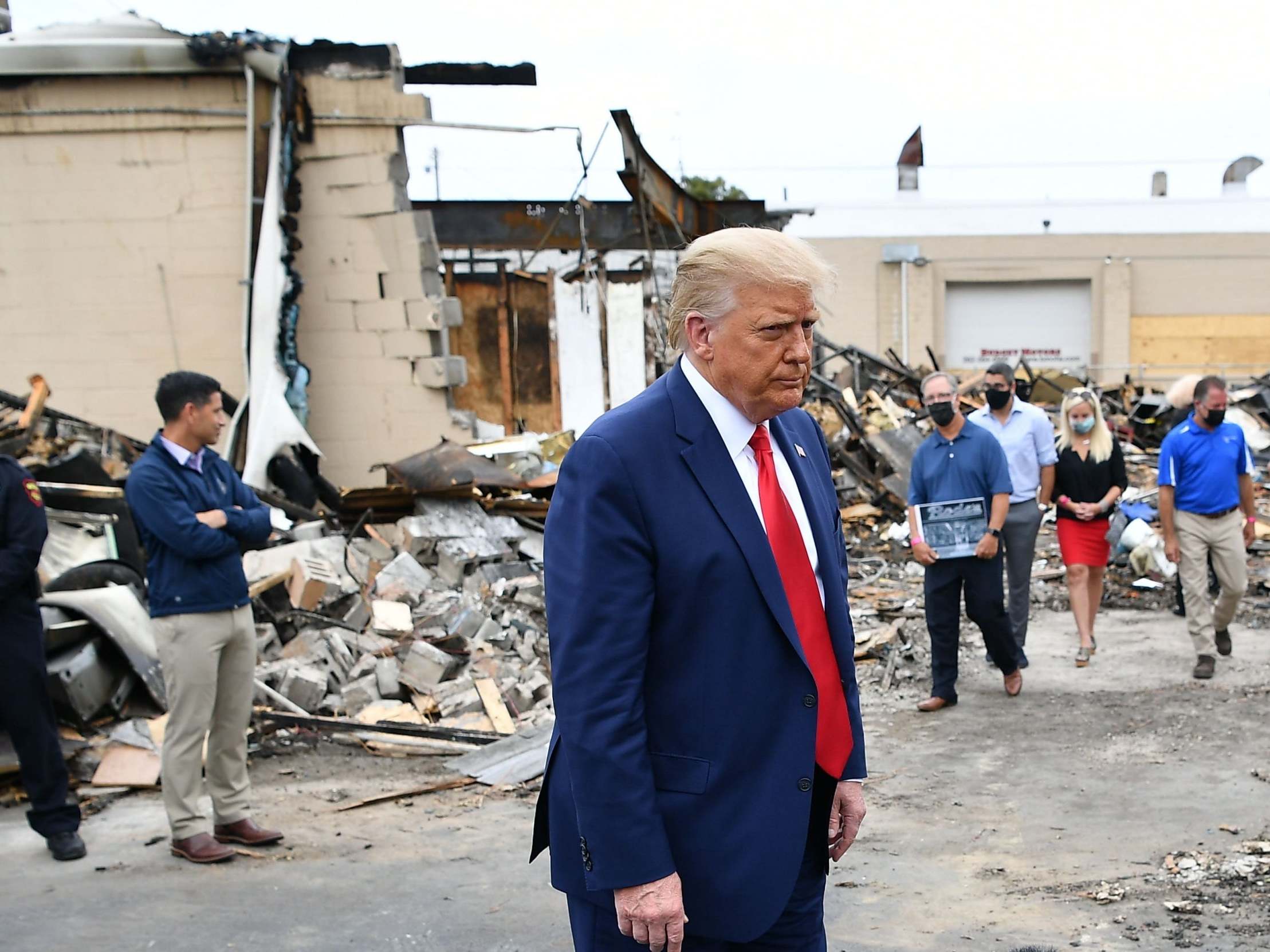 Donald Trump tours an area affected by civil unrest in Kenosha, Wisconsin, on 1 September 2020